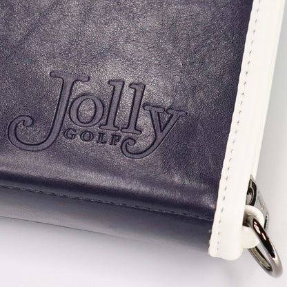 Close-up back view of the Purist Vintage in navy blue synthetic leather golf organizer with Jolly Golf logo.