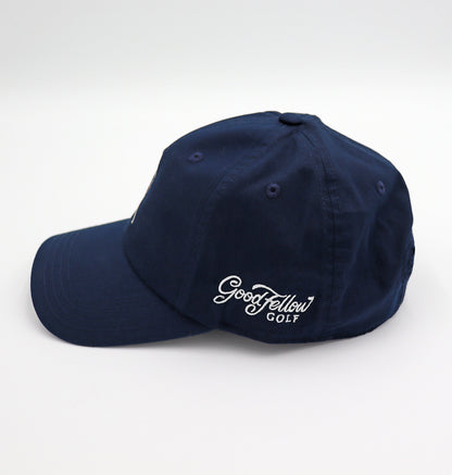 Product image of Good Fellow Golf’s navy blue hat with embroidered logo. Side view.