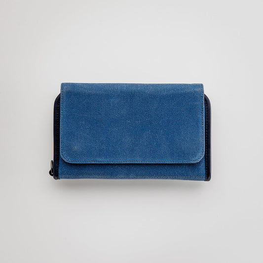 MITCHELL - The Pilgrim Field golf bag organizer by Jolly Golf in blue waxed canvas with synthetic leather trim. Inner view shown in grey-blue herringbone with golf tees, divot tools, ball markers, and more.