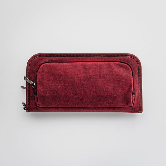 BORLAND - The Purist Field golf bag organizer by Jolly Golf in burgundy waxed canvas with synthetic leather trim. Inner view shown in beige herringbone with golf tees, divot tools, ball markers, and more.