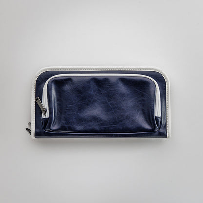 The Purist Vintage golf bag organizer pouch by Jolly Golf in navy blue synthetic leather.