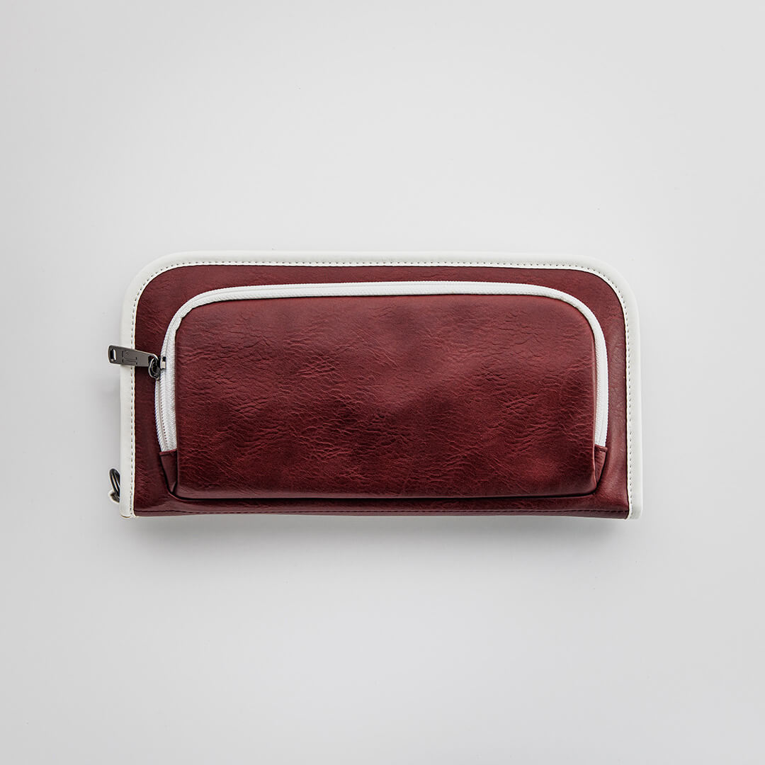 The Purist Vintage golf bag organizer pouch by Jolly Golf in burgundy synthetic leather.