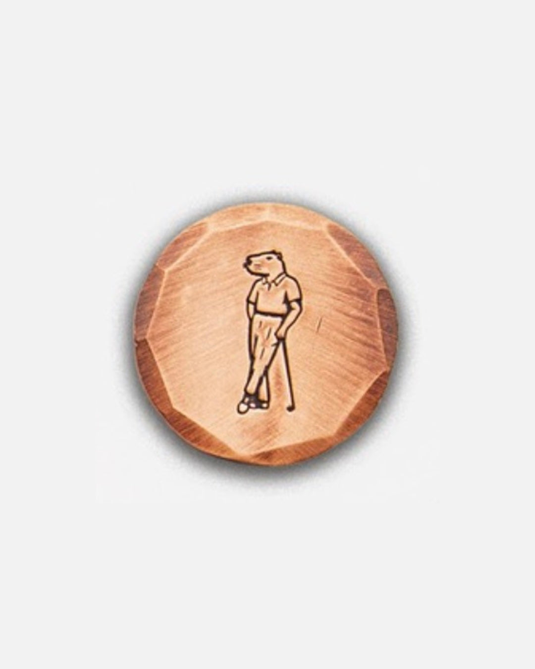 Bronze ball marker with Jolly capybara logo by Seamus Golf