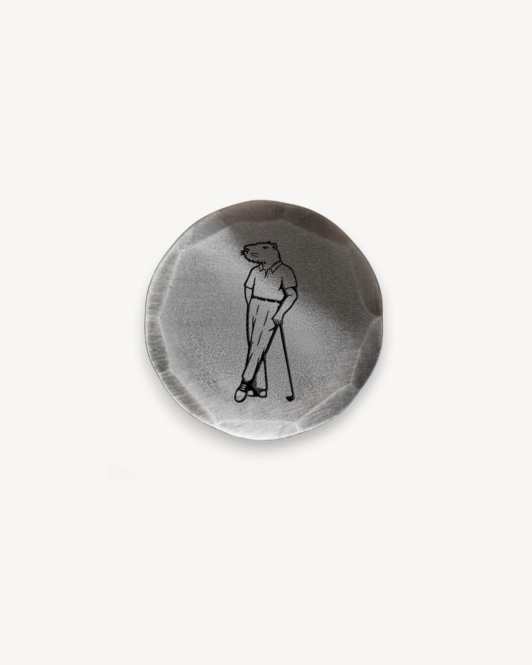 Steel ball marker with Jolly capybara logo by Seamus Golf
